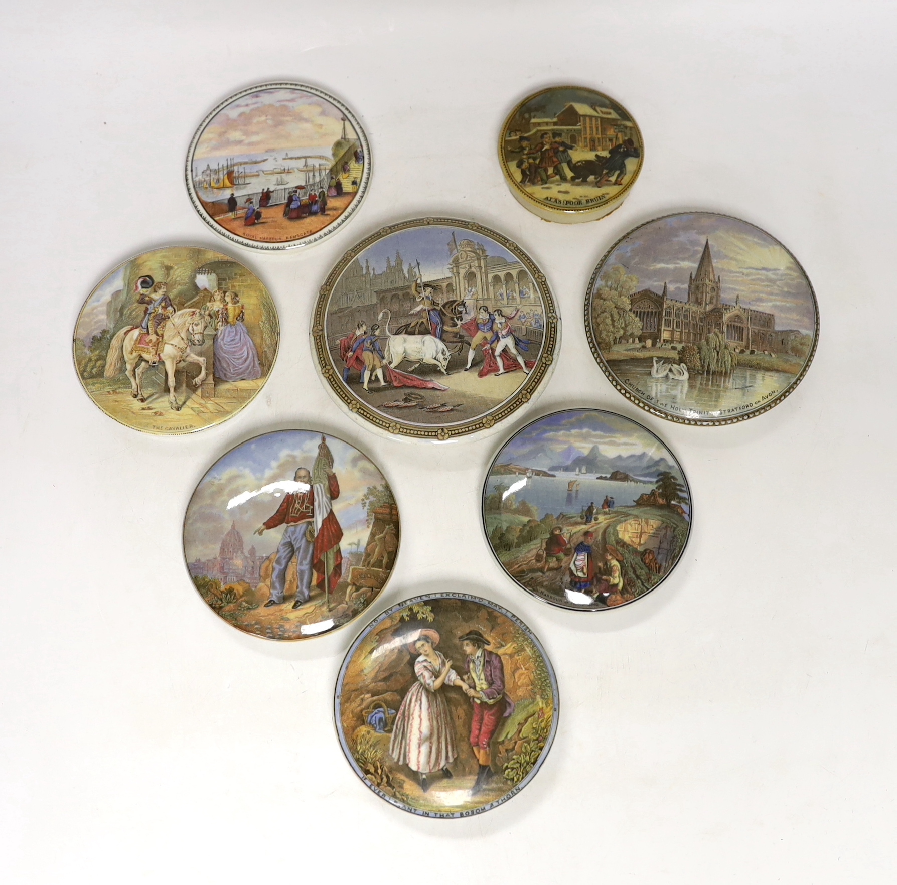 Eight Victorian ceramic Prattware pot lids, including ‘Alas Poor Bruin’ scene with bear, largest 13cm